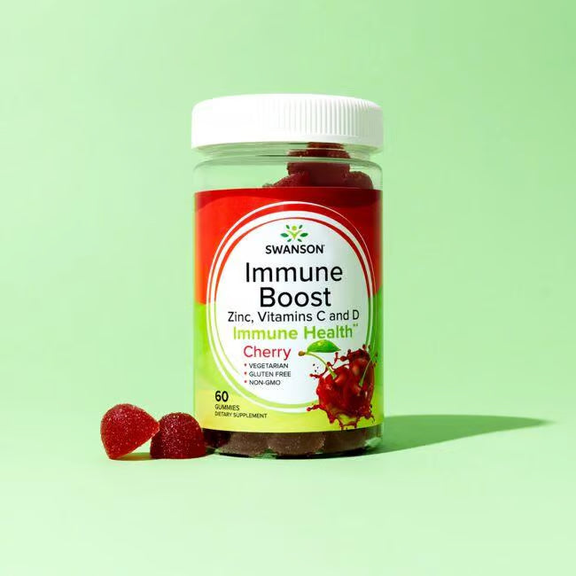 Swanson immune boost supplement jar with gummies on a green background